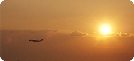 拍摄夕阳和飞机同框的照片ー临空海滩ー
